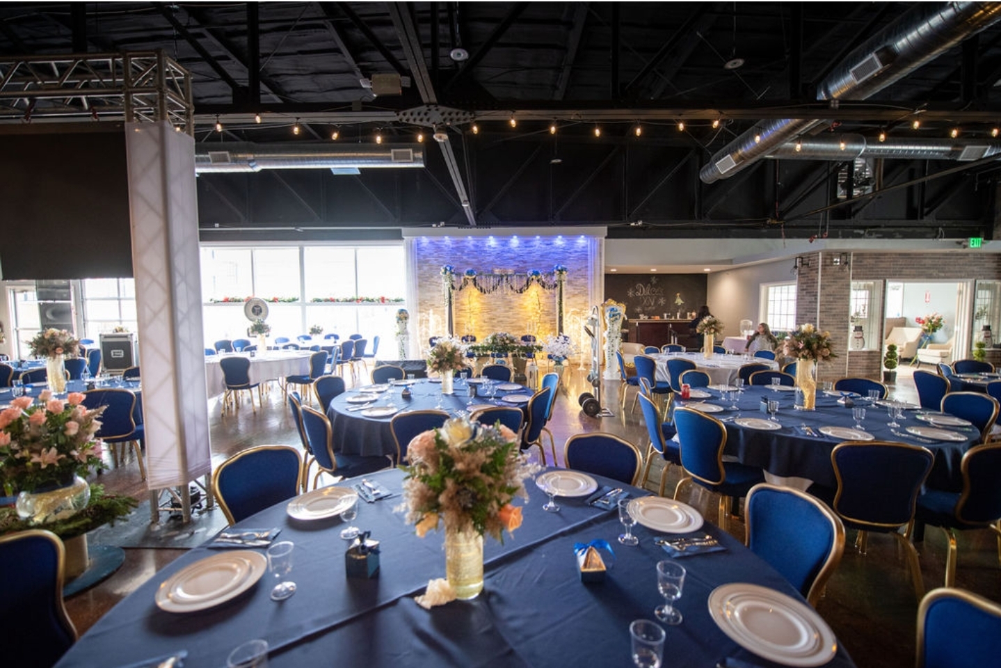 royal blue dining tables set up for a celebration