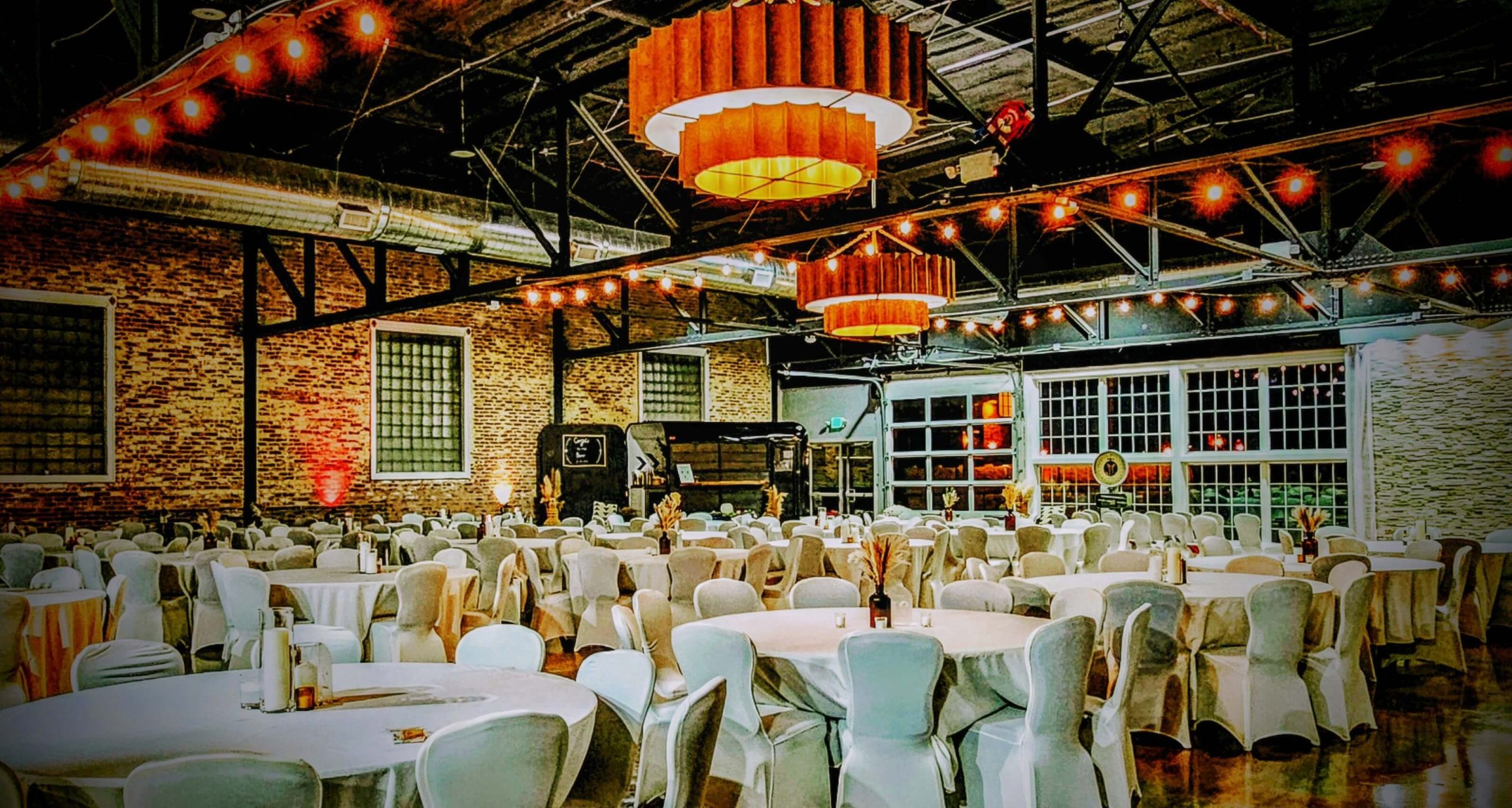 white dining tables and red lighitng